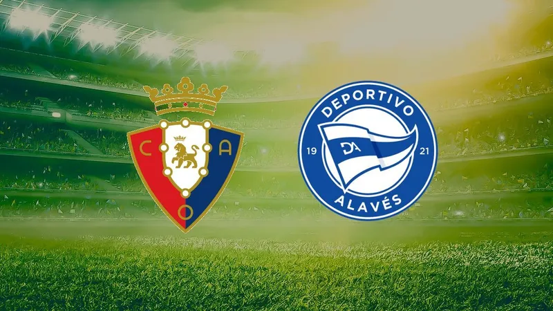 Cầu thủ của Osasuna dùng kỹ thuật cá nhân để vượt qua cầu thủ Alavés trên sân cỏ Cầu thủ của Osasuna dùng kỹ thuật cá nhân để vượt qua cầu thủ Alavés trên sân cỏ